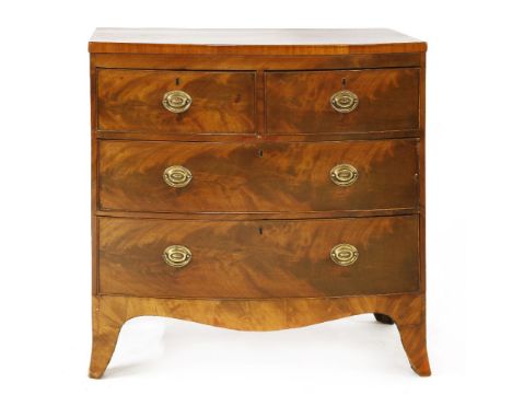 A George III mahogany bow front chest of drawers,the two short and two long drawers on splayed bracket feet,89cm wide48cm dee