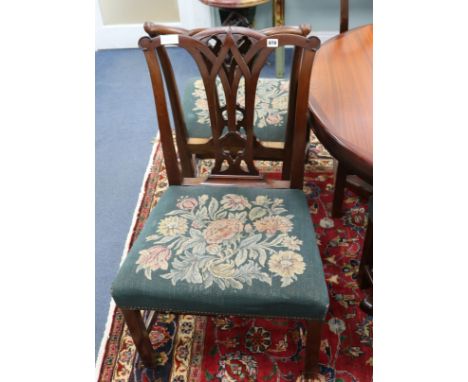 A set of ten Chippendale-style mahogany chairs