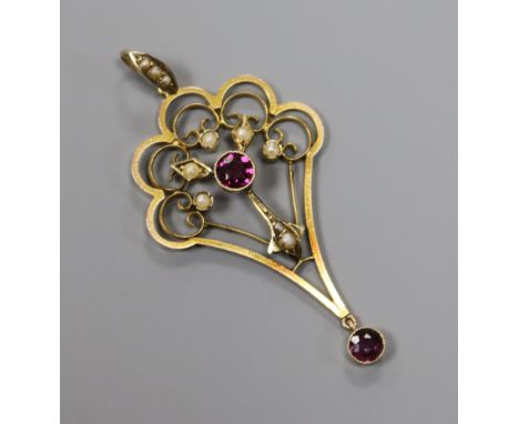 An early 20th century 9ct gold, amethyst and split pearl drop pendant, 45mm.