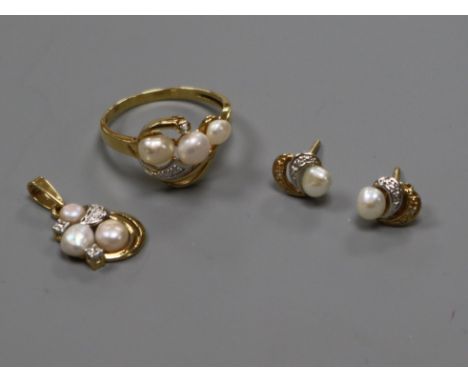A modern suite of 18ct gold, cultured pearl and diamond jewellery, comprising a ring, pendant and pair of ear studs.
