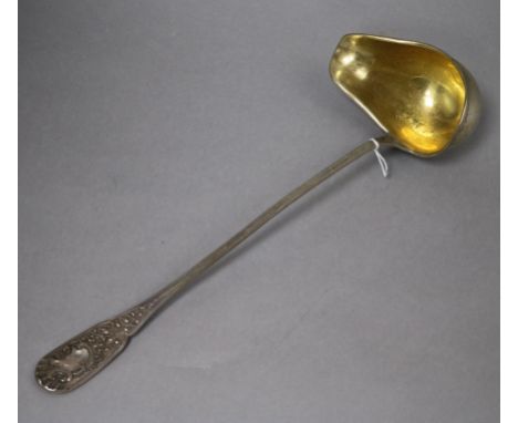 An ornate early 20th century German 800 white metal soup ladle, 37cm, 8 oz.