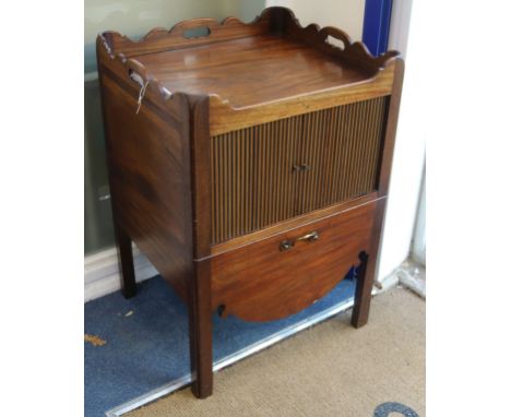 A mahogany tray-top commode with tambour shutters W.58cm