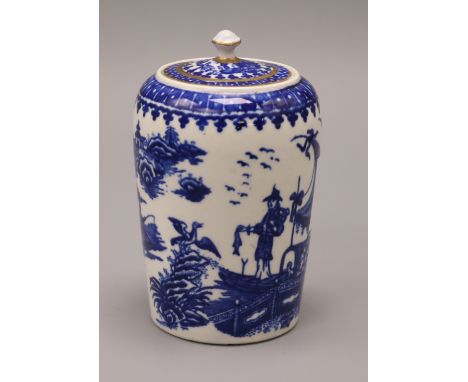 A Worcester fisherman and cormorant tea caddy and cover