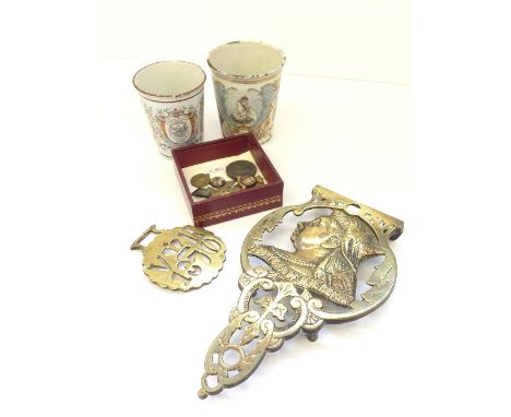 An unusual brass trivet modelled as Queen Victoria in the commemoration of her 60th year of Reign together with two commemora