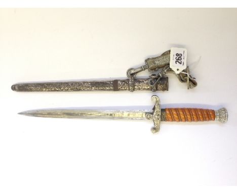A WWII German Nazi officers dagger with orange handle in original scabbard with pommel and attachments, the blade engraved Pa