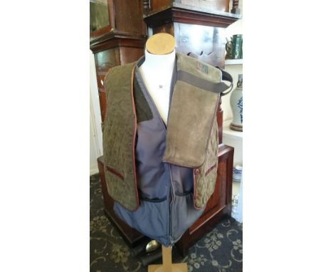 A gentleman's suede leather hunting gilet by Rey Pavon together with a gentleman's lined Gamo hunting gilet and a Clisport su