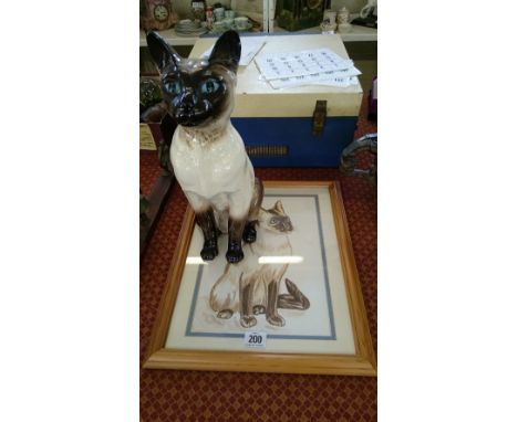 A large Beswick china model of a Siamese cat (ear repaired) together with a framed and glazed watercolour of the same item.