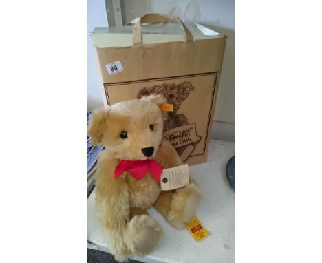 A modern Steiff Teddy bear with original box.