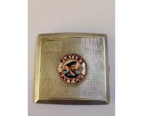 An engraved silver cigarette case later enamel decorated with a Players Navy cut advertising symbol (136 grams).