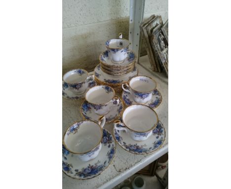 A Royal Albert bone china afternoon tea service, decorated in the Moonlight Rose pattern.
