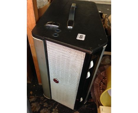 A mid 20th century Bush Monarch portable record player.