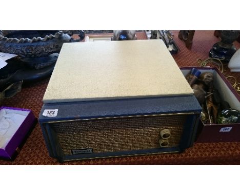 A Dansette Celebrity portable electric record player.