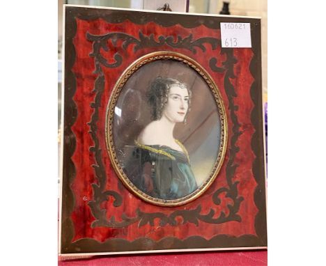 An oval miniature: half length portrait of a noblewoman, in boullework frame, 14 x 12 cm overall