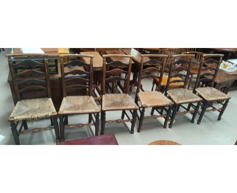 A set of 6 Wigan ladder back dining chairs with canted top rails and rush seats (a.f.) 