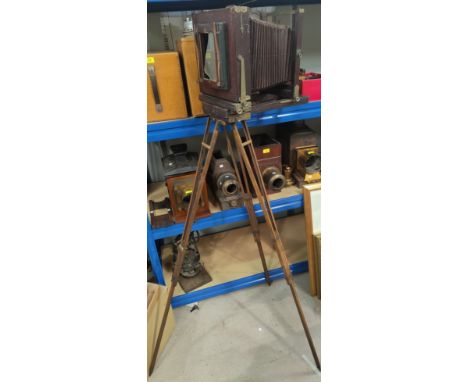 An antique Kodak plate camera on stand 