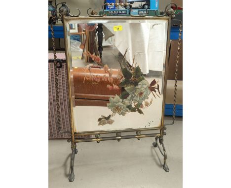 A Victorian brass aesthetic style firescreen with bevelled mirror panel decorated with flowers, height 80 cm 