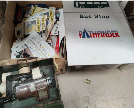 A Lancashire Bus ticket machine and a large selection of bus memorabilia 