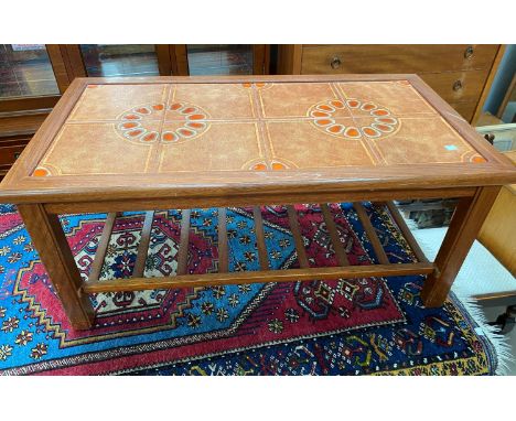 A teak tile top coffee table, 87 cm; a G-Plan table and a bedding box 