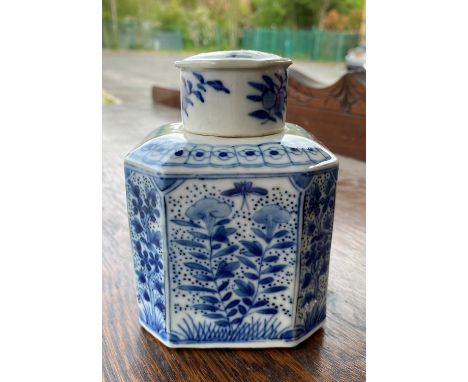 A Chinese blue and white canted squared lidded tea caddy with floral decoration, height 12cm - good condition but lid stuck o