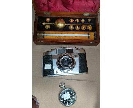 A Sikes hydrometer, mahogany case; a ministry issue pocket watch by Cyma; a camera 