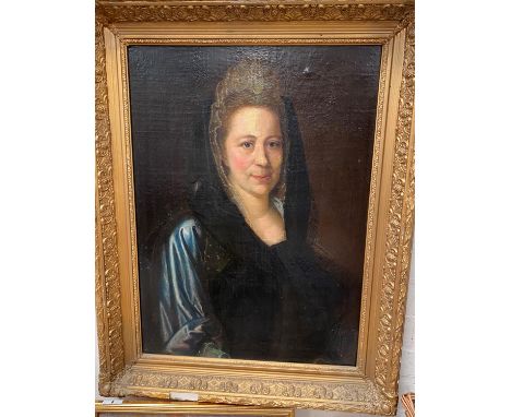 19th Century ENGLISH SCHOOL - Oil on canvas, head and shoulders portrait of a woman with a lace head dress, unsigned, 68 x 50