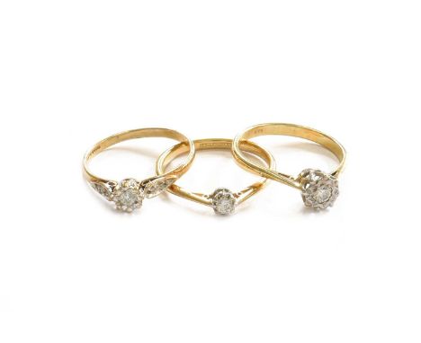 An 18 Carat Gold Diamond Solitaire Ring, finger size S; A 9 Carat Gold Diamond Solitaire Ring, finger size S; and Another Dia