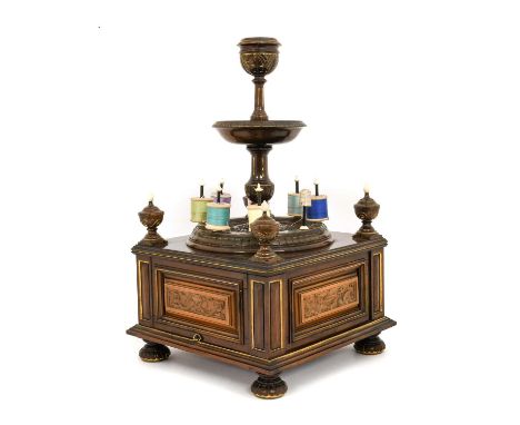 A Parcel Gilt, Rosewood, Walnut and Ivory-Mounted Sewing Compendium, circa 1840, the urn-shaped holder on a baluster stem wit