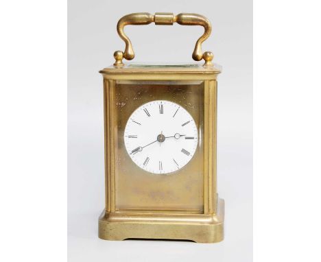 A Brass Carriage Timepiece, with enamel dial, together with a pair of pewter three light candelabra, stamped Les Etains du Ma