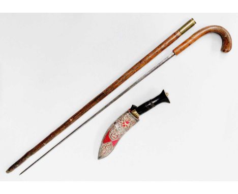A 19th Century Sword Stick, and a presentation knifeBlade length, 67.5cm&nbsp;Some engraved decoration near the handle, hard 