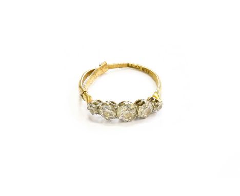 A Diamond Five Stone Ring, the graduated old cut diamonds, in yellow claw settings, to a tapered shoulder plain polished shan