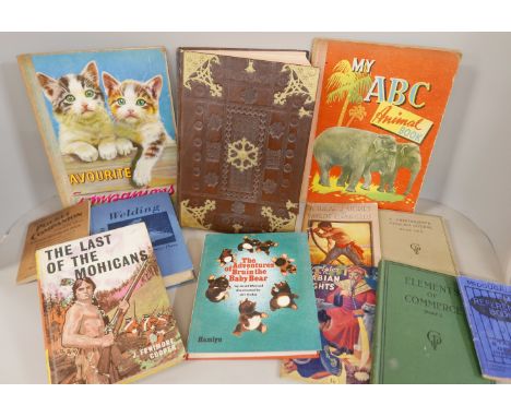 A box and a tin trunk of books **PLEASE NOTE THIS LOT IS NOT ELIGIBLE FOR IN-HOUSE POSTING AND PACKING** 