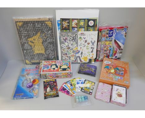 Pokémon stickers, vintage, including McDonalds, a Pocket Monsters Jumbo card, a Chinese Charizard set, a Japanese Bandai set,