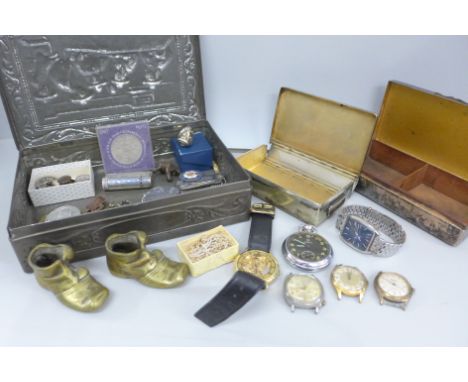 A Bulova wristwatch, other watches, a compass, a sandwich box, etc.