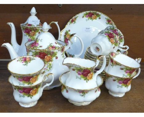 A Royal Albert Old Country Roses tea set, 6 cups, saucers, side plates, tea pot, coffee pot, cream and sugar, bread and butte