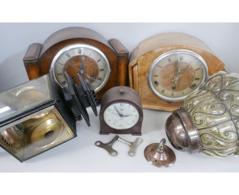 Two wooden mantle clocks, one with chiming movement, a Smiths electric clock, a carriage lamp and a glass lightshade **PLEASE