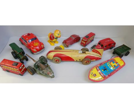 A collection of tin plate toys, many clockwork, including a Chad Valley land speed car, red car, two Wells Brimtoy double-dec