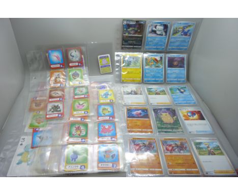 A collection of Pokémon playing cards (vintage), Pokémon board game sets and eighteen Japanese Pokémon cards