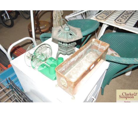 A cast iron garden light; a copper jardiniere etc  