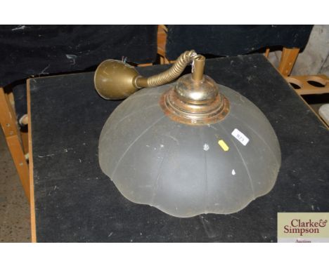 A frosted glass pendant ceiling light 
