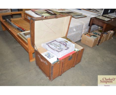 A leather bound travel trunk and contents of various Christmas decorations