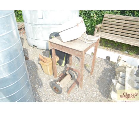 A collection of miscellaneous items to include a motorbike box; a school desk; a sack barrow base; a drain hopper etc 