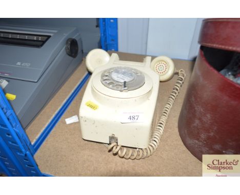 A rotary dial telephone