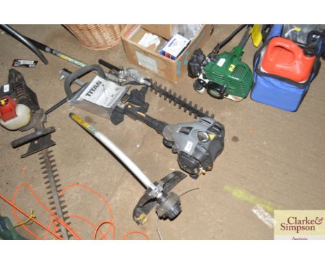 A Titan multi-tool with hedge trimmer and strimmer attachment