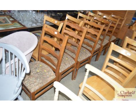 A set of 6 ladder back dining chairs