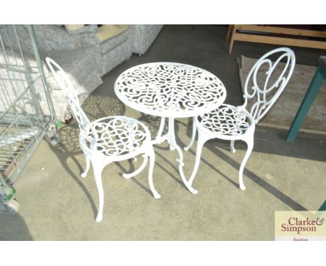 A white metal garden table and a pair of chairs 