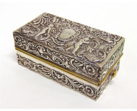 A LATE VICTORIAN SILVER BOX makers mark indistinct, possibly overstruck, London 1896, embossed in the rococo taste, originall