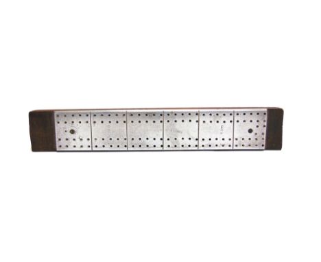 [AIRSHIP INTEREST]. A CRIBBAGE BOARD  believed to have been partially constructed from re-used airship metal, the drilled alu