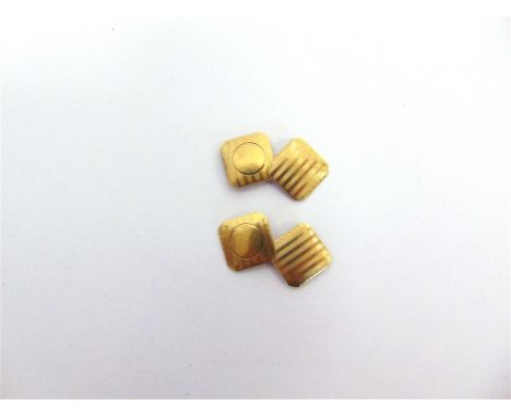 A PAIR OF CUFFLINKS  stamped '10K', with engine turned decoration, 3.8g gross