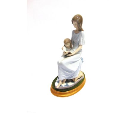A LLADRO GROUP 'BEDTIME STORY'  27cm high, complete with box