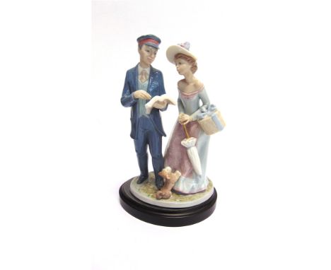 A LLADRO GROUP 'STATION MASTER'  20cm high, complete with box